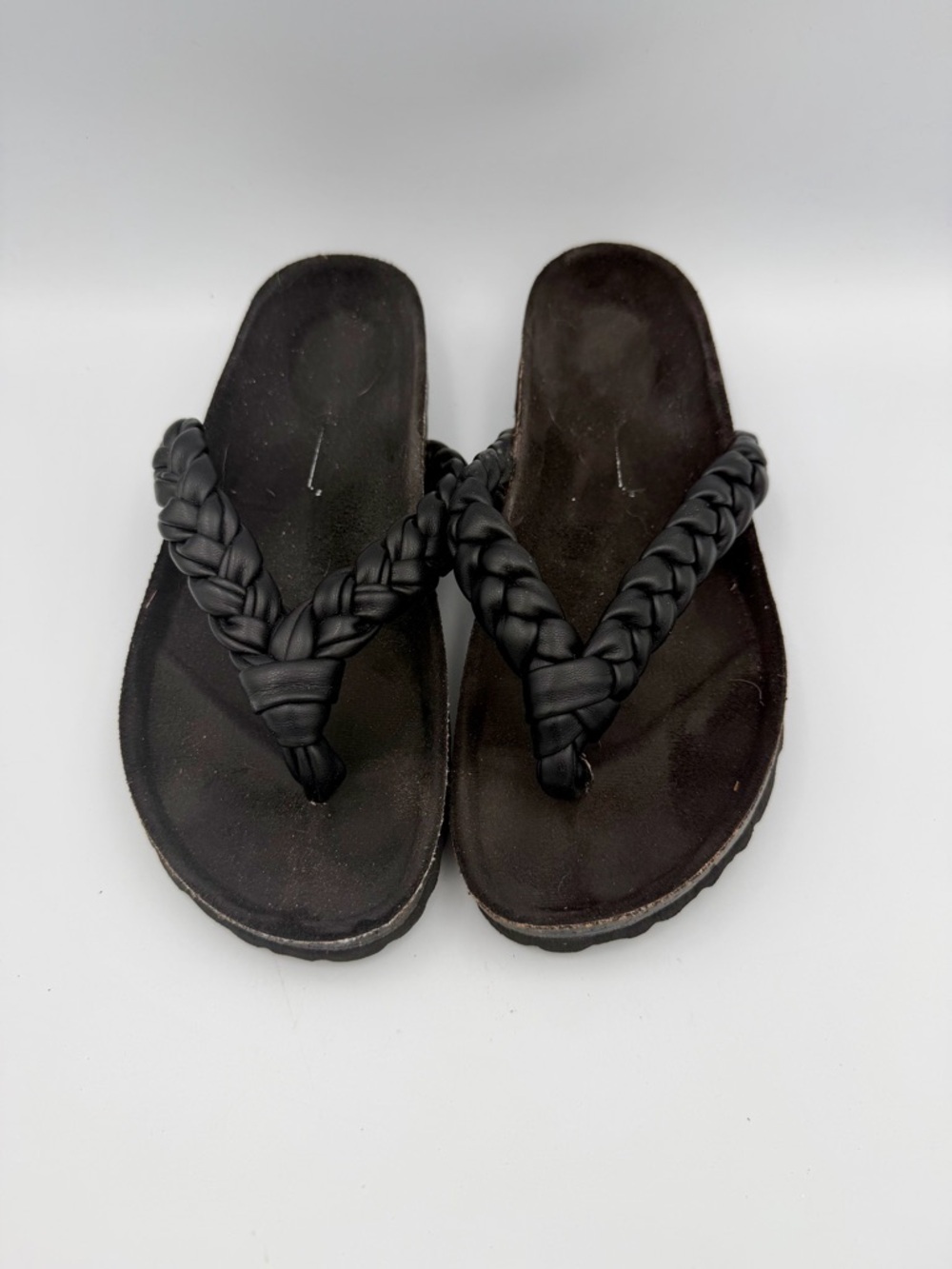 INTENTIONALLY BLANK Braided Black Thong Sandals